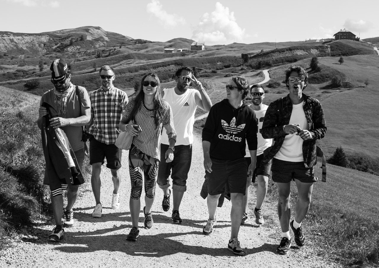 adidas Journeys team walking together on an alpine trail in Südtirol