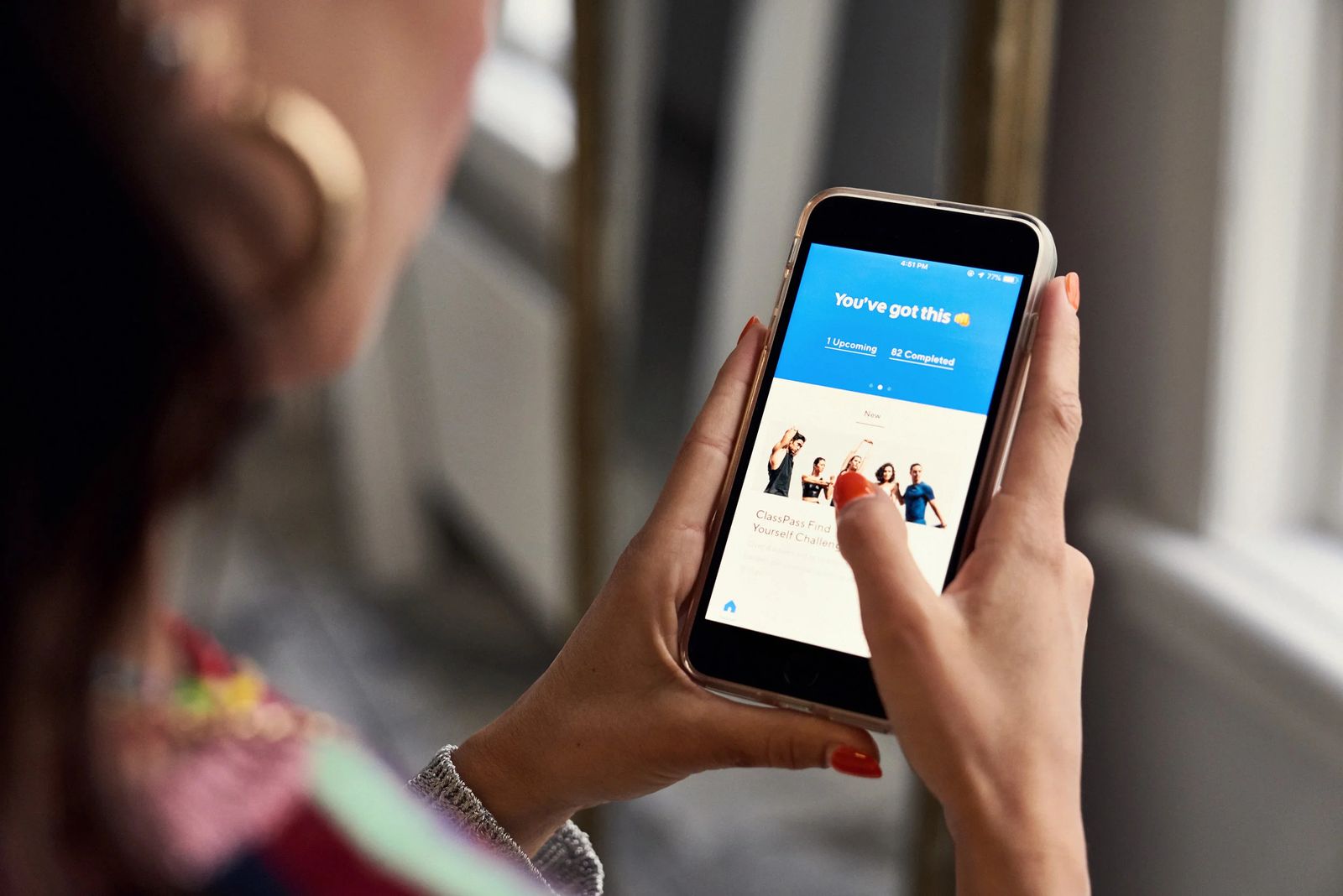 Booking a class in the ClassPass app on a phone, ClassPass #bethebalance editorial in Amsterdam