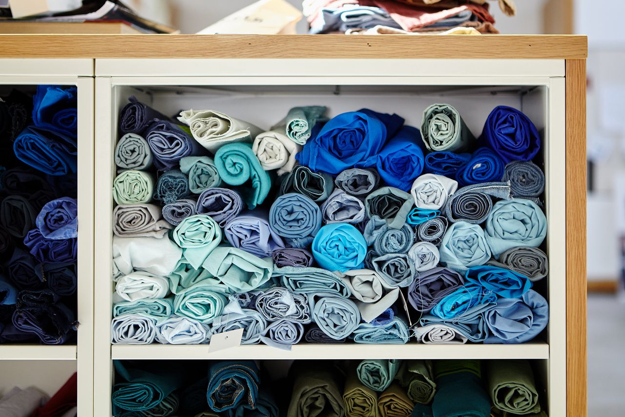 Shelves of folded blue denim at the CLOSED headquarters in Hamburg