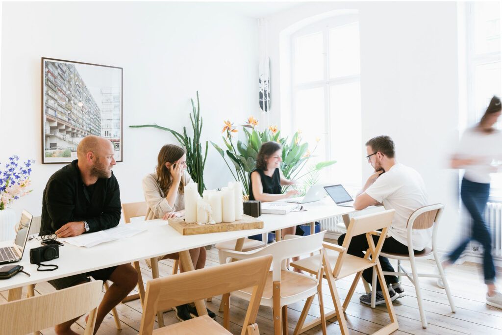 Workshop around the long dining table in the Friends Apartment