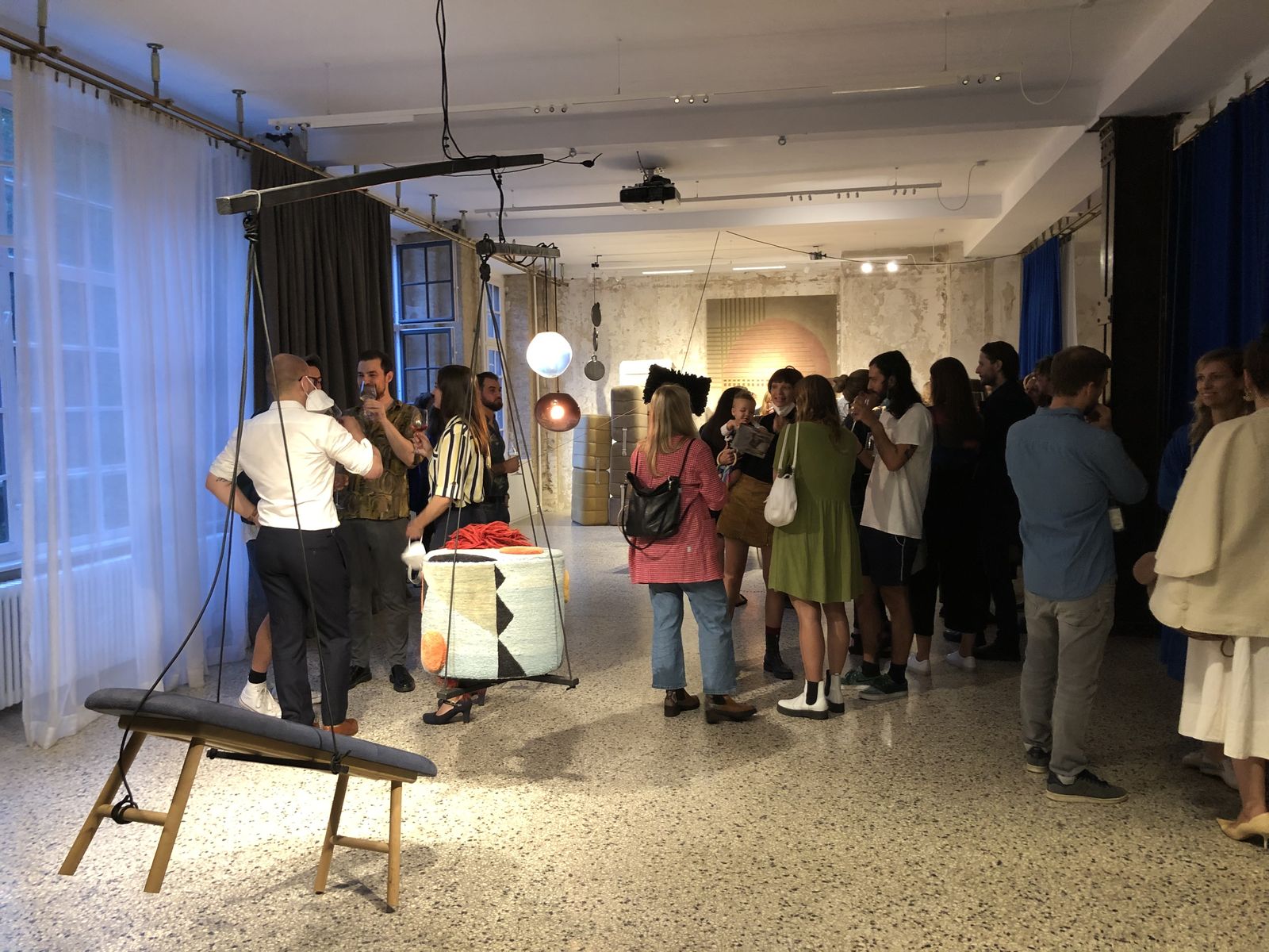 Visitors at the opening of the Balancing Acts design exhibition in the Friends Space