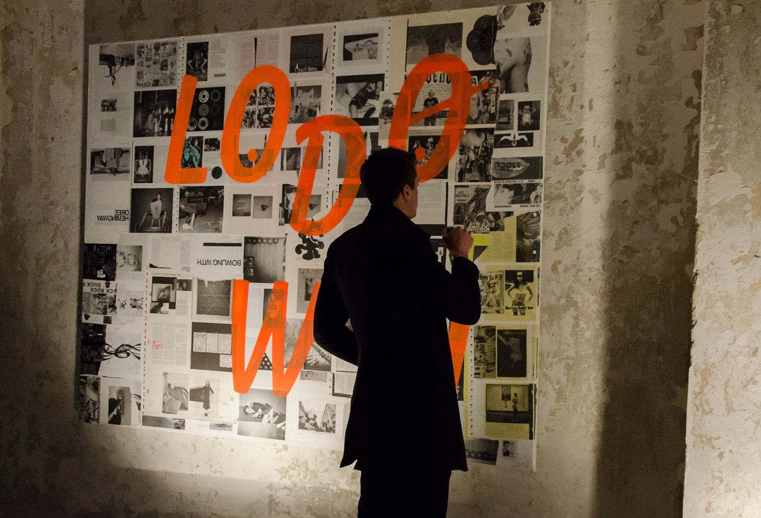 Guest in front of a Lodown wall installation at the magazine's 100th issue launch, Friends Space