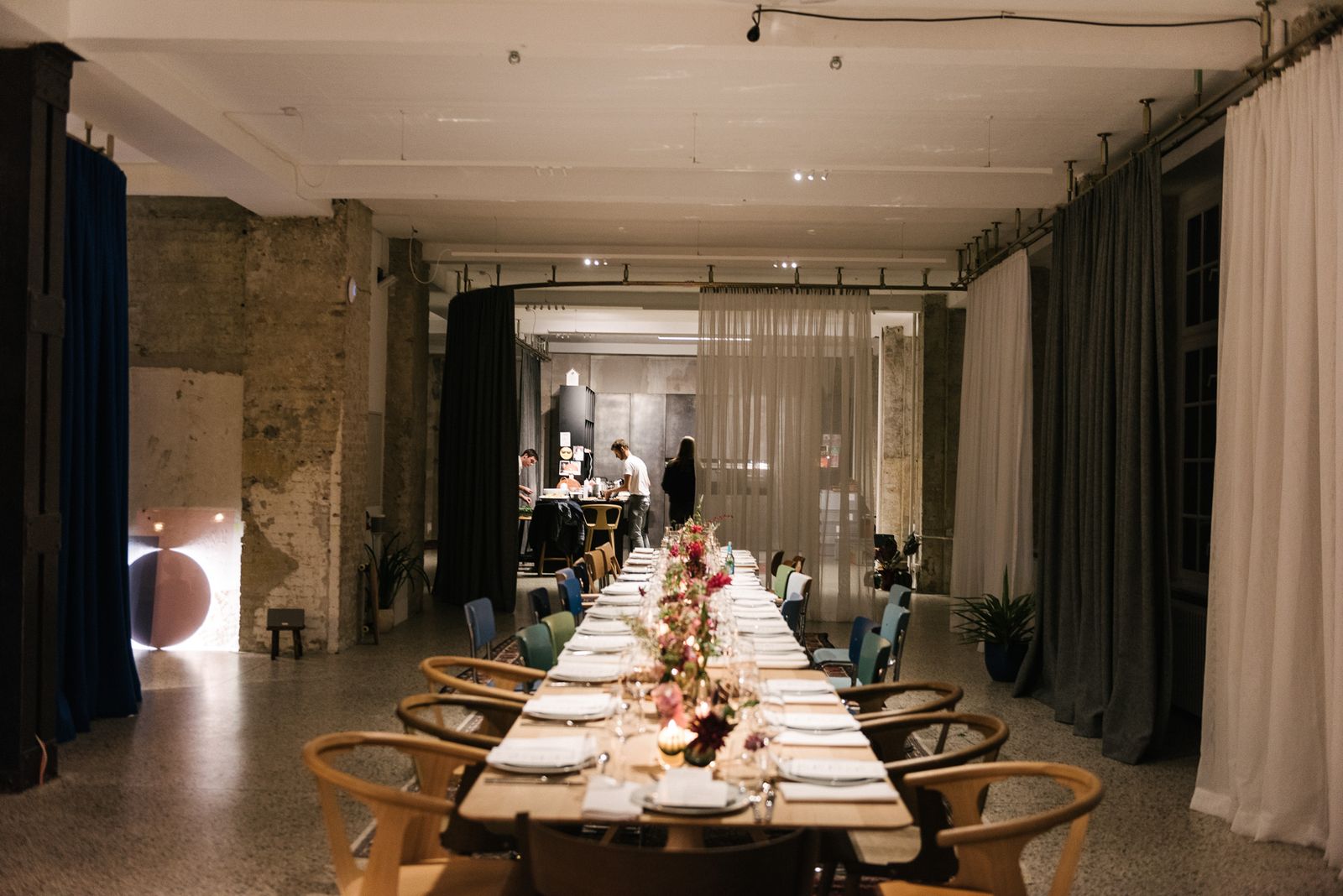 Candlelit long table set for the Royal Norwegian Embassy dinner in the Friends Space