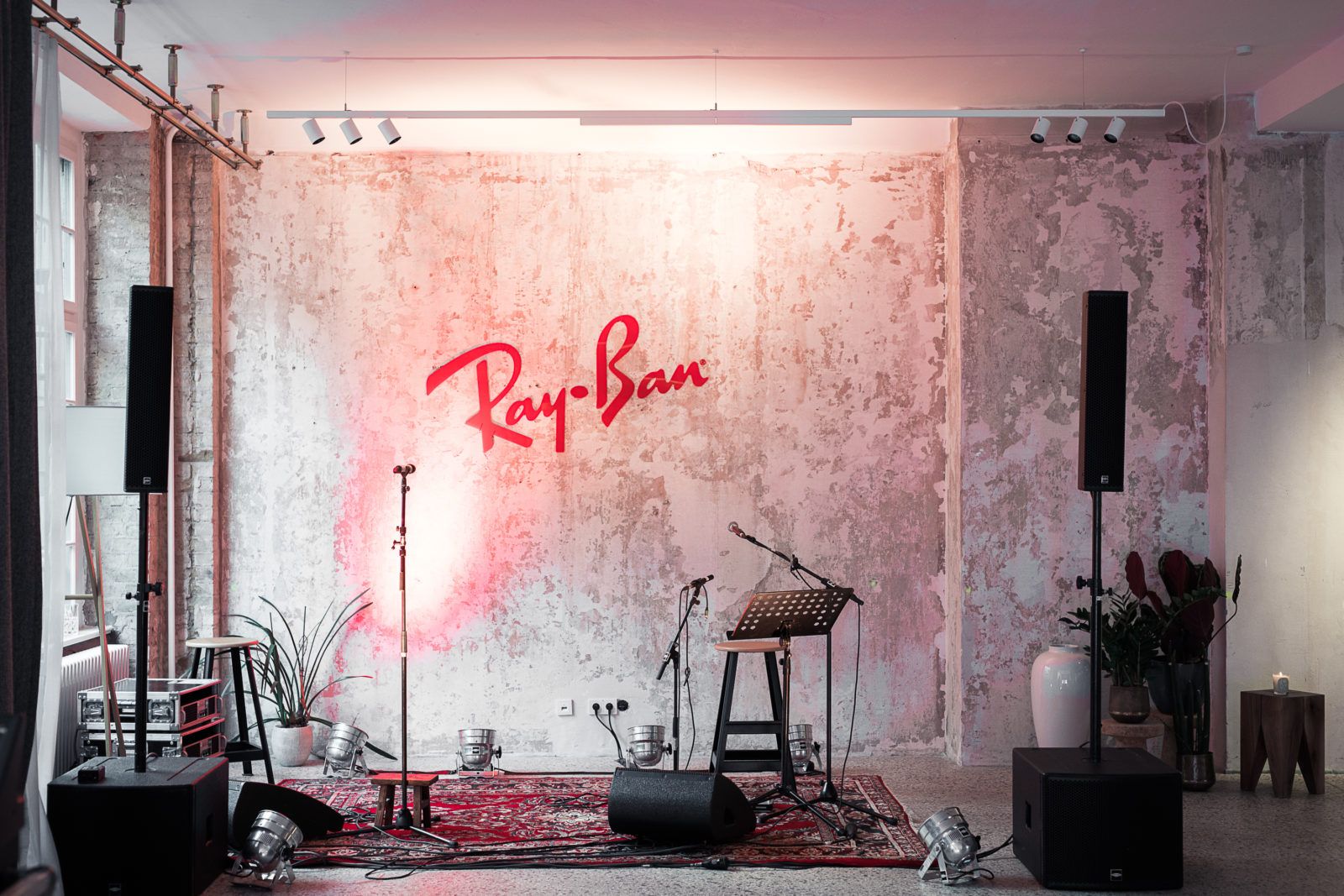 Ray-Ban neon sign and stage set in the Friends Space for a product launch and private concert