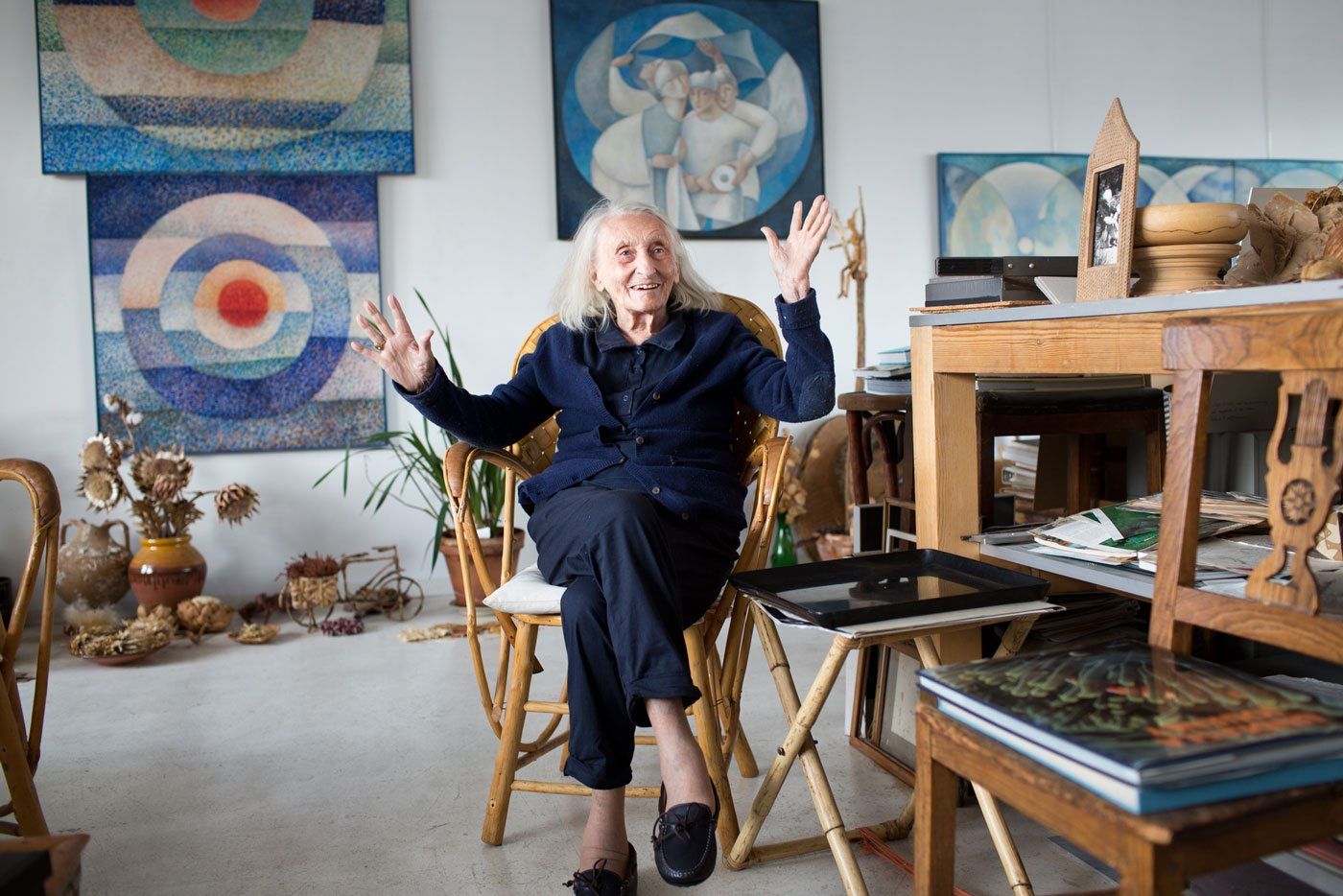 Painter seated among her canvases and ceramics in her studio, Freunde von Freunden portrait