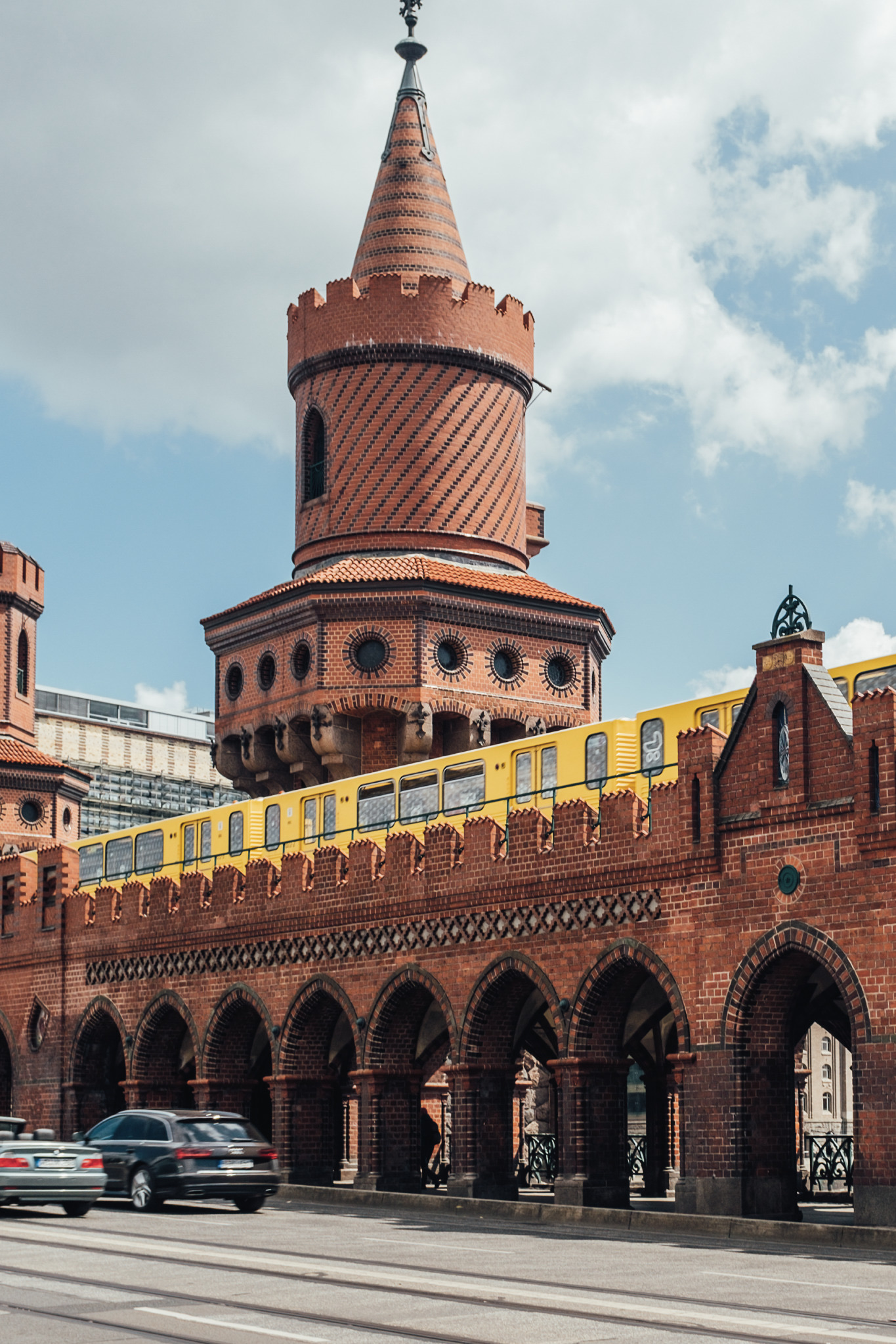 Yellow U-Bahn crossing the Oberbaum Bridge, You, Me & Berlin campaign photography