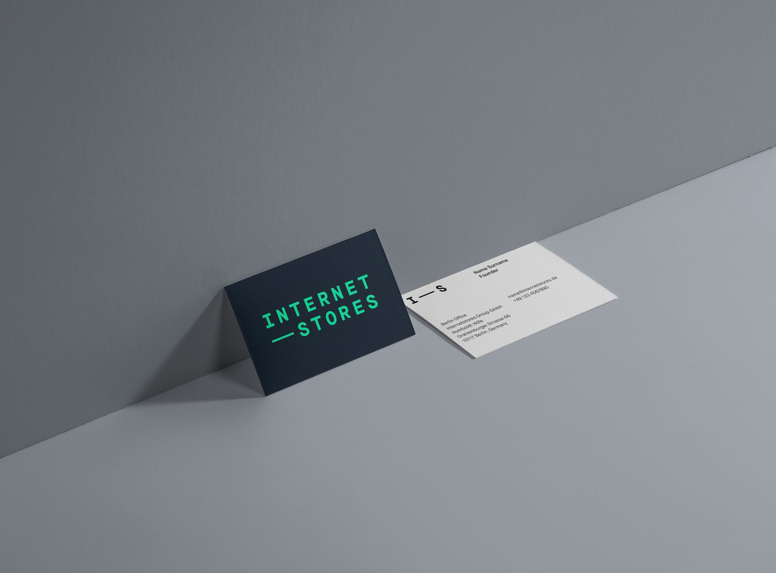 Internetstores business cards on a grey surface