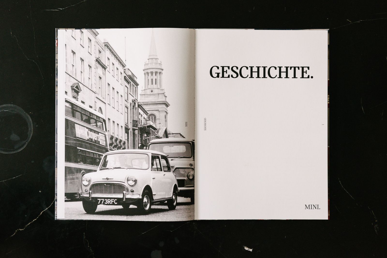 MINI Lookbook spread, Geschichte, with a black and white photo of a classic Mini