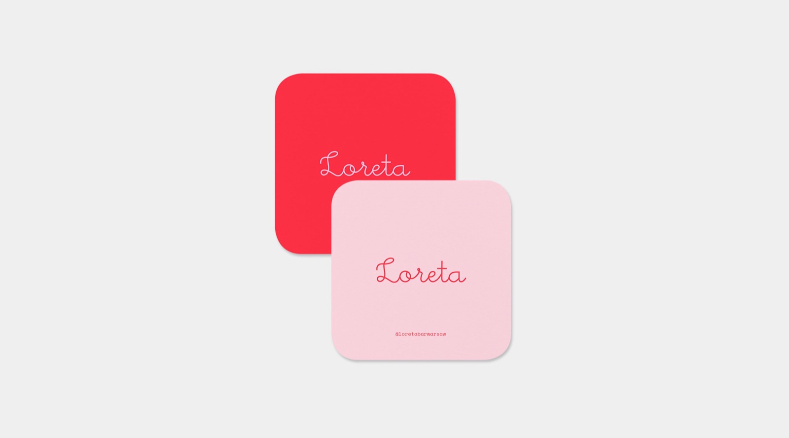 Loreta coasters in red and pink with script logo