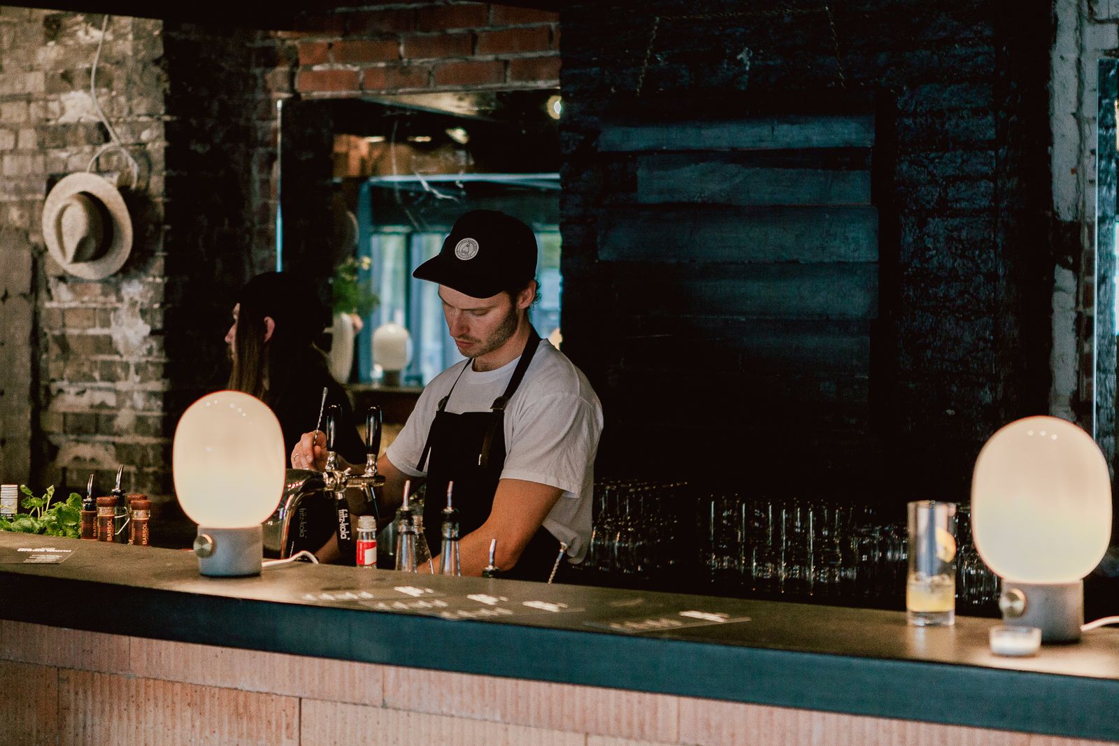 Bartenders at work behind the bar of the Sonos IFA hub