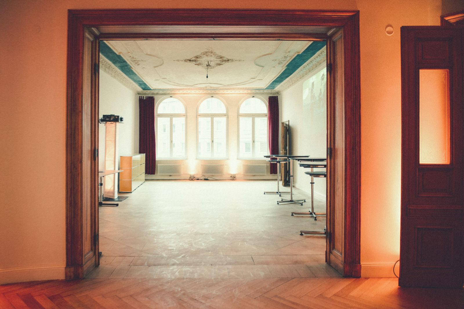 View through open double doors across the Münzstudio apartment in Berlin Mitte