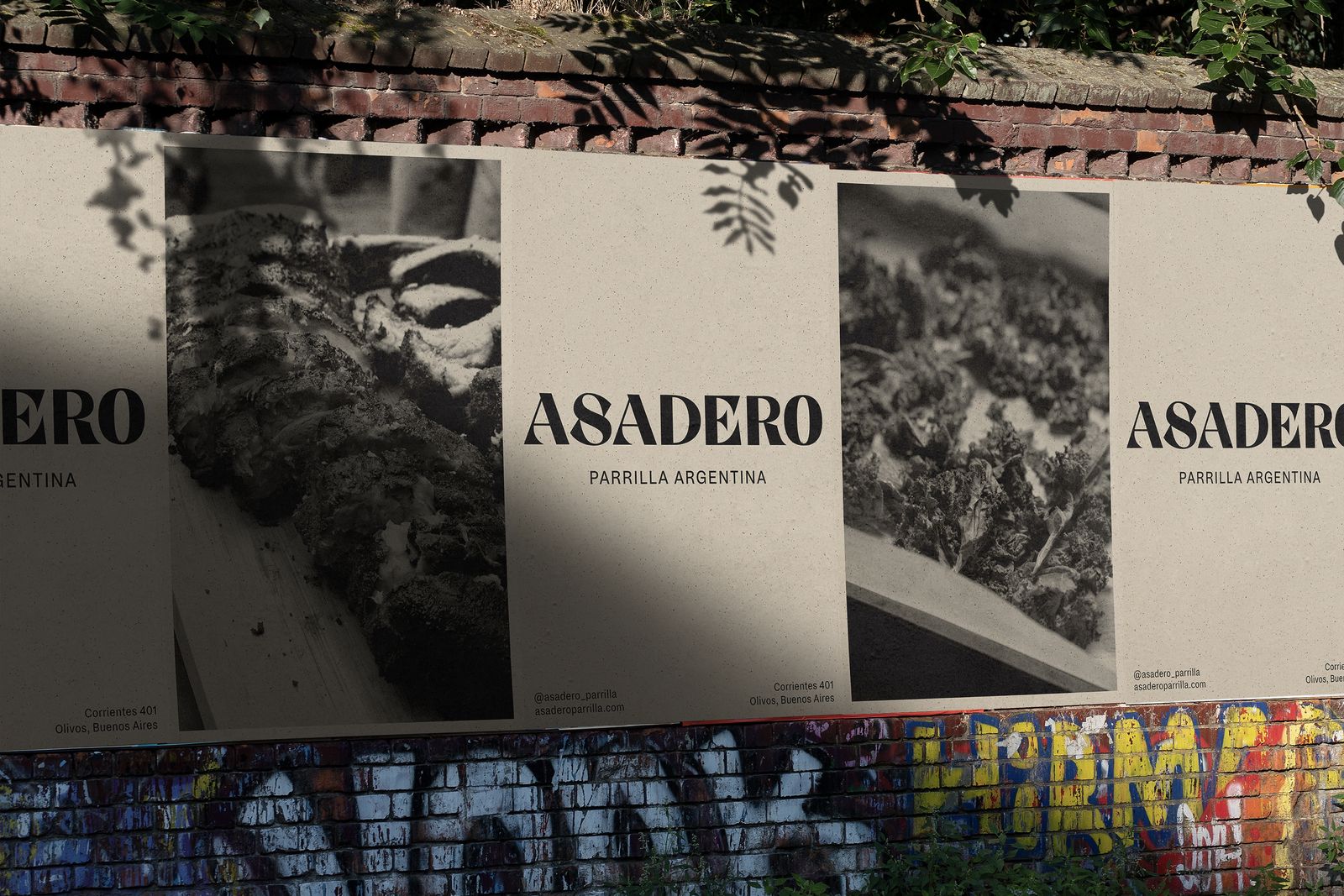 Asadero Parrilla Argentina posters with black and white grill photography pasted on a street wall