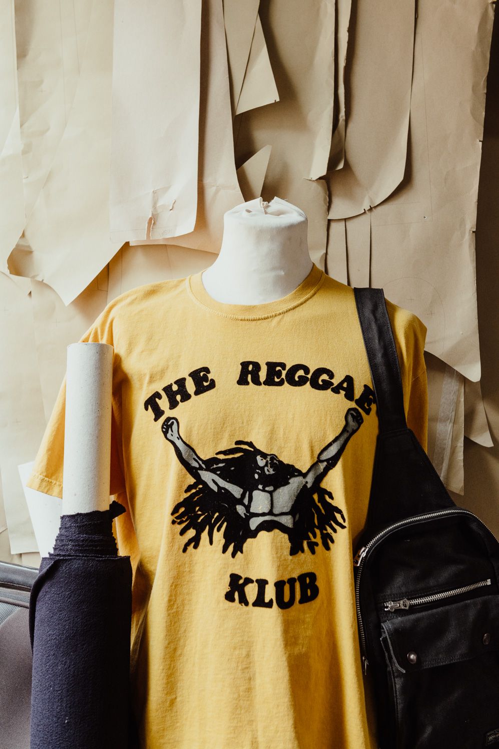 Yellow Reggae Klub T-shirt on a mannequin in the studio