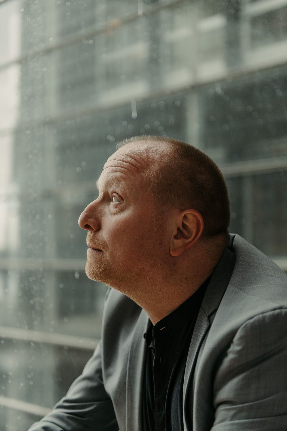 Portrait of the sound researcher looking up, in profile