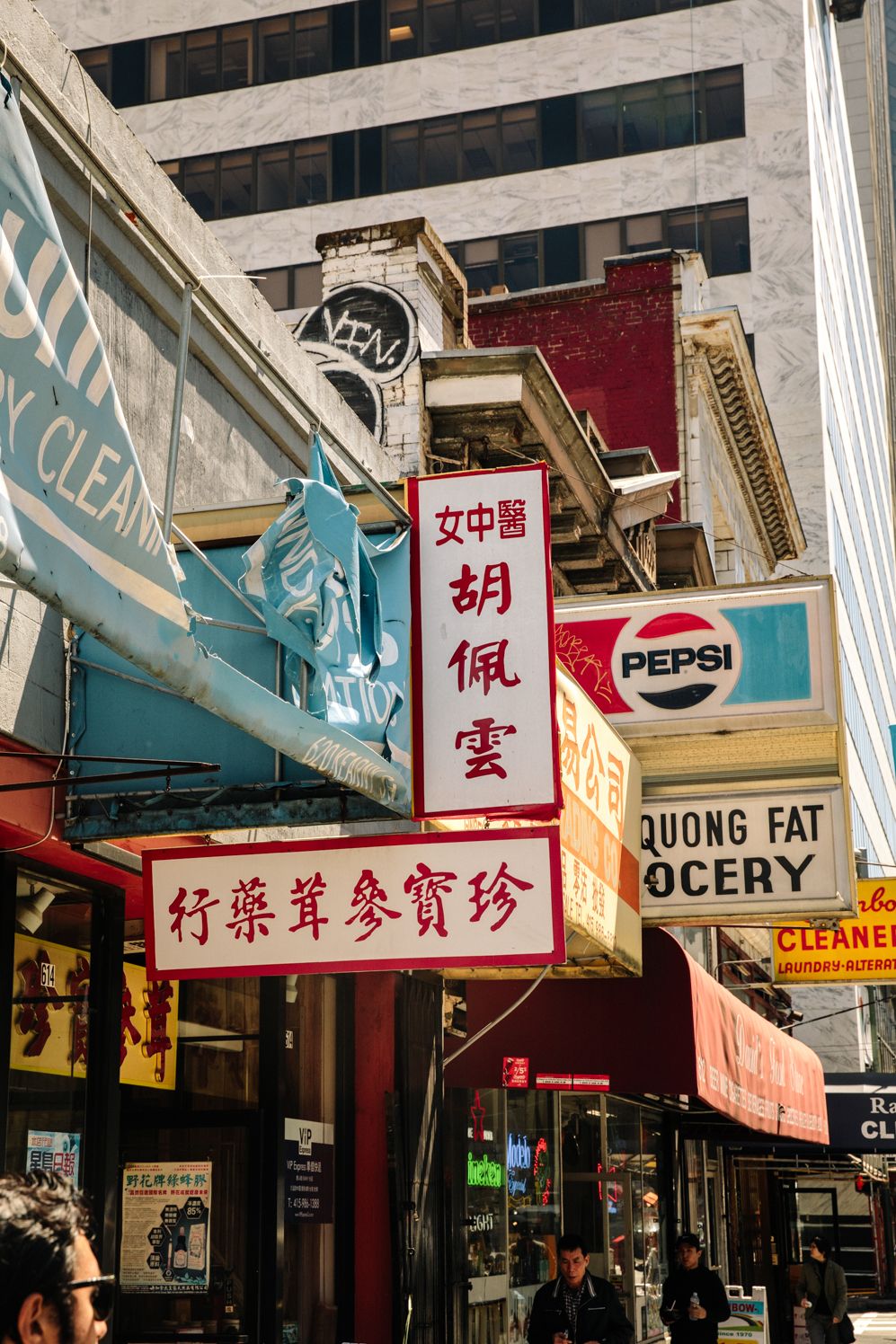 Shop signs and a grocery front in San Francisco Chinatown
